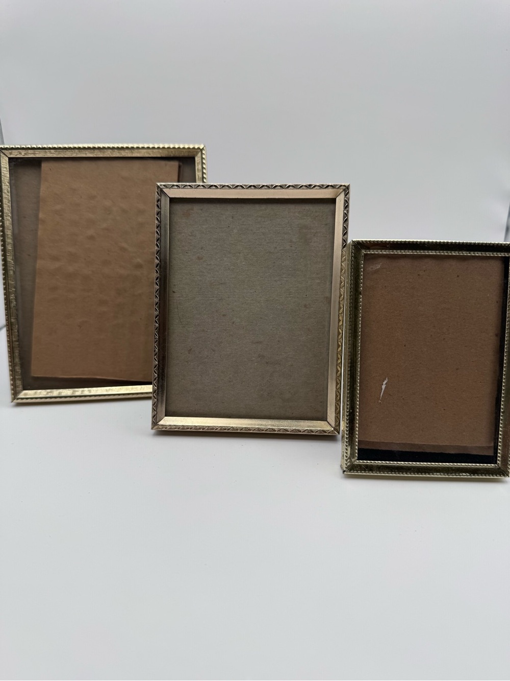 Gold Tone Metal Picture Frames Lot of 3 Graduated Sizes Tabletop Easel Backs
